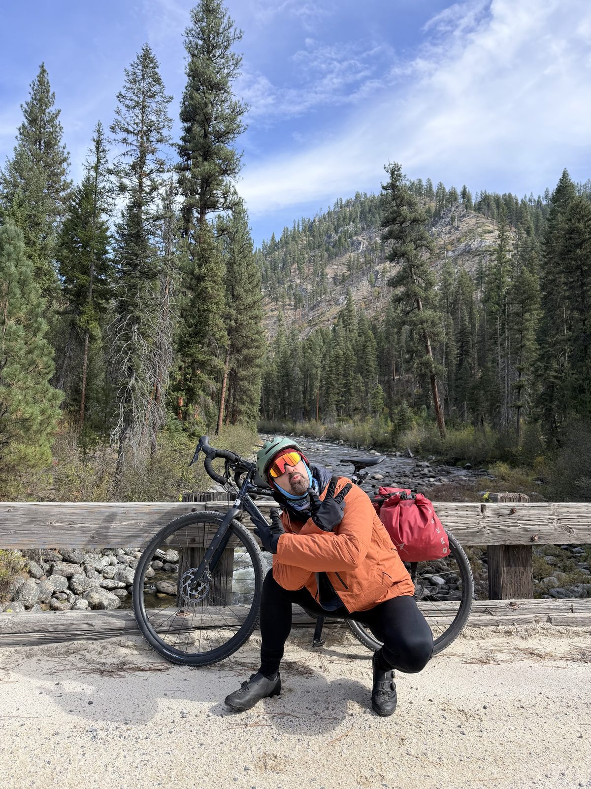 Nick resting on a bridge